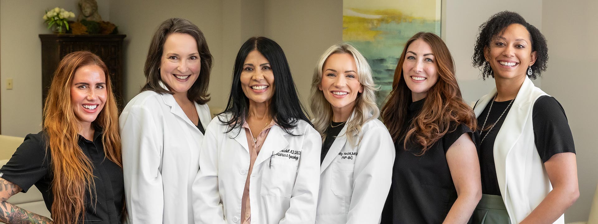 This a group photo of Dr. Naomi Paschall and her staff, including Julie Park, Emily Hecht, Krista Morton, Tiffany Bankett and Meegan Pearson.