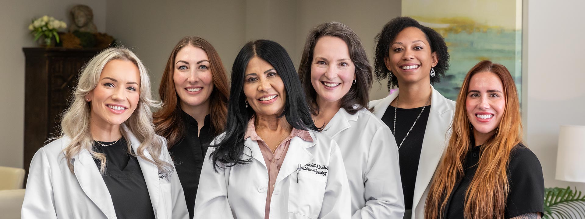 This a group photo of Dr. Naomi Paschall and her staff, including Julie Park, Emily Hecht, Krista Morton, Tiffany Bankett and Meegan Pearson.