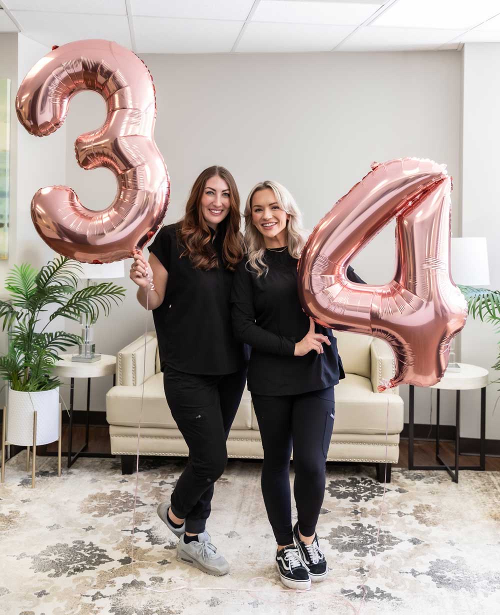 This is an image of Emily Hecht, FNP-BC, and Krista Morton, LE, of Omega Aesthetics.